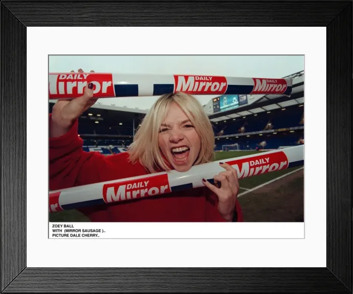 Framed Print : Zoe Ball TV presenter with the Daily Mirror Soccer Sausage Framed Print : Zoe Ball TV presenter with the Daily Mirror Soccer Sausage