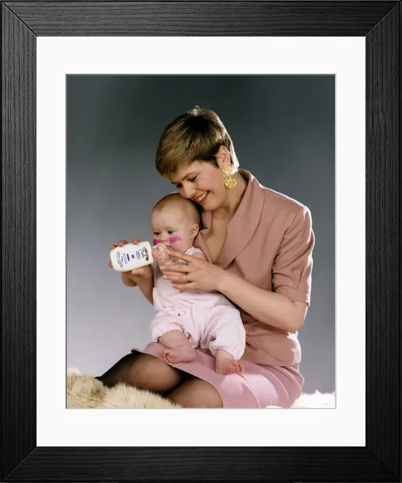Framed Print : Liz Earl TV presenter with her 5 month old daughter Lily Circa 1992 Framed Print : Liz Earl TV presenter with her 5 month old daughter Lily Circa 1992