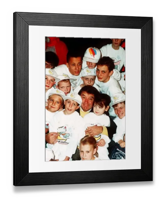  : Jimmy Tarbuck TV Presenter Comedian at Heathrow with handicapped children who are on a