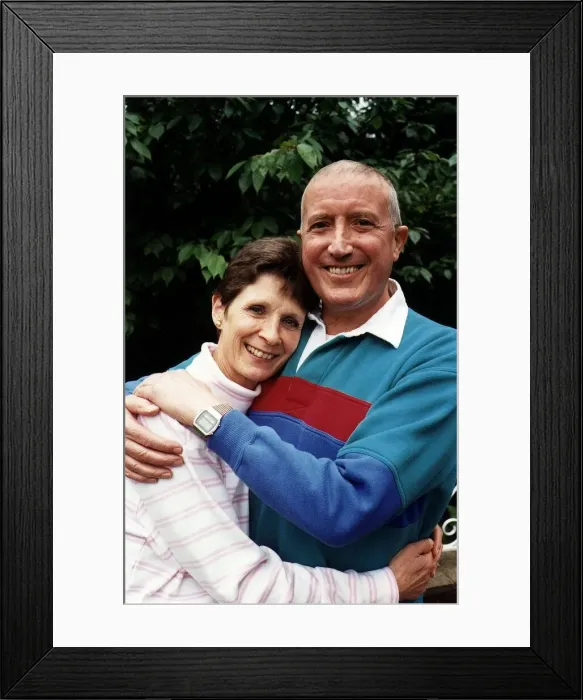 Framed Print : Roy Castle TV Presenter with arms round wife