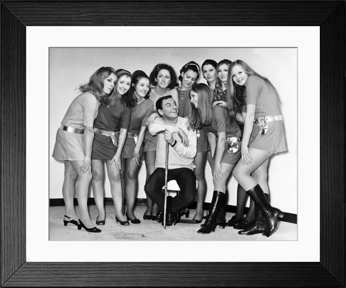 Framed Print : Bob Monkhouse Comedian TV Presenter with the Knickette Girls who are to work in his new