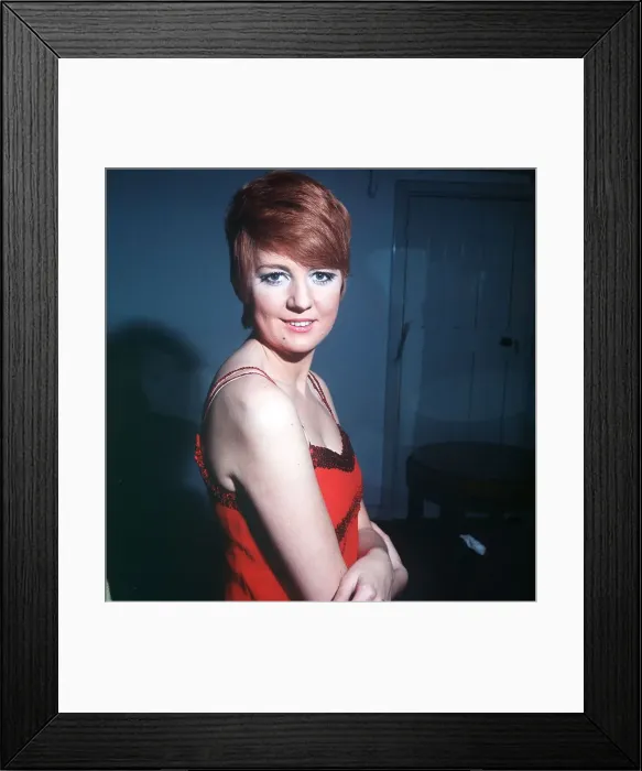 Framed Print : Singer and TV Presenter Cilla Black in low cut red dress Framed Print : Singer and TV Presenter Cilla Black in low cut red dress