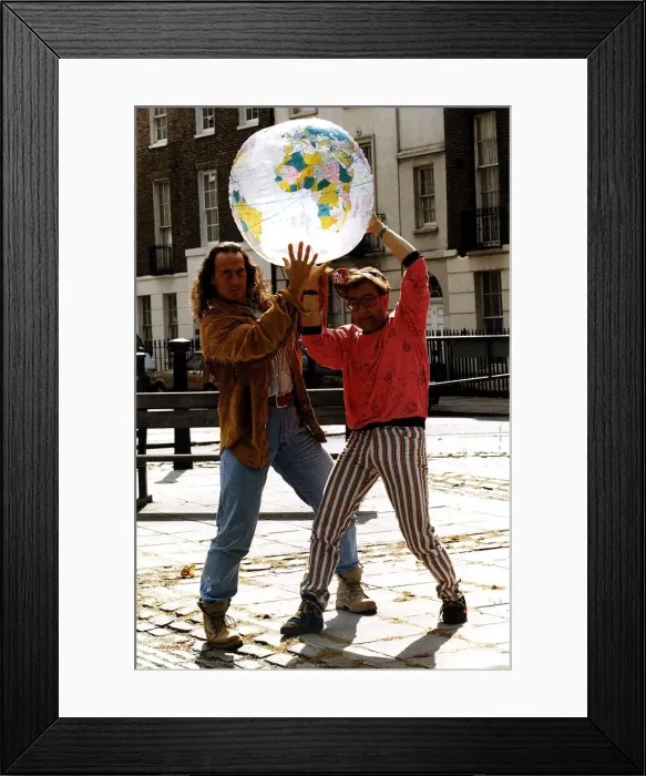 Framed Print : Michael Van Wijk Entertainer Holding model of world with Timmy Mallet on street Dbase Framed Print : Michael Van Wijk Entertainer Holding model of world with Timmy Mallet on street Dbase