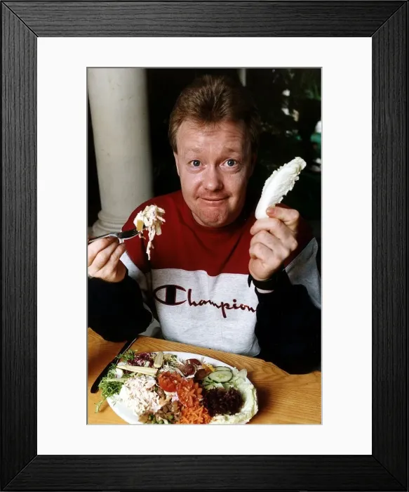 Framed Print : Keith Chegwin TV Presenter spends a day at a health club eating at table