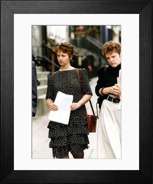 Framed Print : Anne Diamond TV Presenter walking holding some papers Framed Print : Anne Diamond TV Presenter walking holding some papers