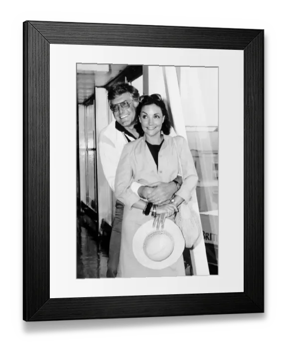 Framed Print : Kathryn Evans Singer and her husband Peter Purves TV Presenter at Heathrow airport after