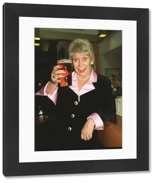 Liz Dawn Vera Duckworth of Coronation Street raises a glass to celebrate her taking over