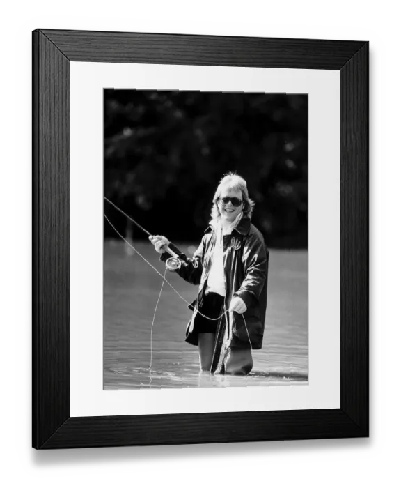 Framed Print : Bruno Brookes Disc Jockey practices his fly fishing in one of the ponds near his home in Framed Print : Bruno Brookes Disc Jockey practices his fly fishing in one of the ponds near his home in