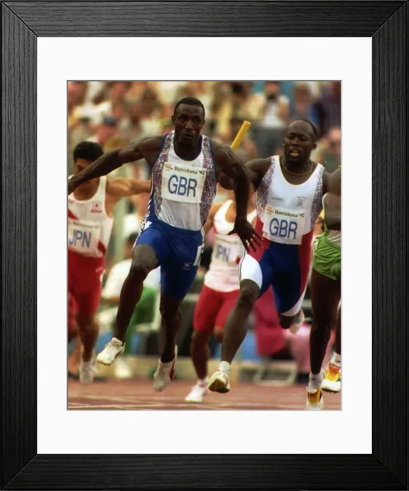 Framed Print : Linford Christie athlete carries baton in a relay