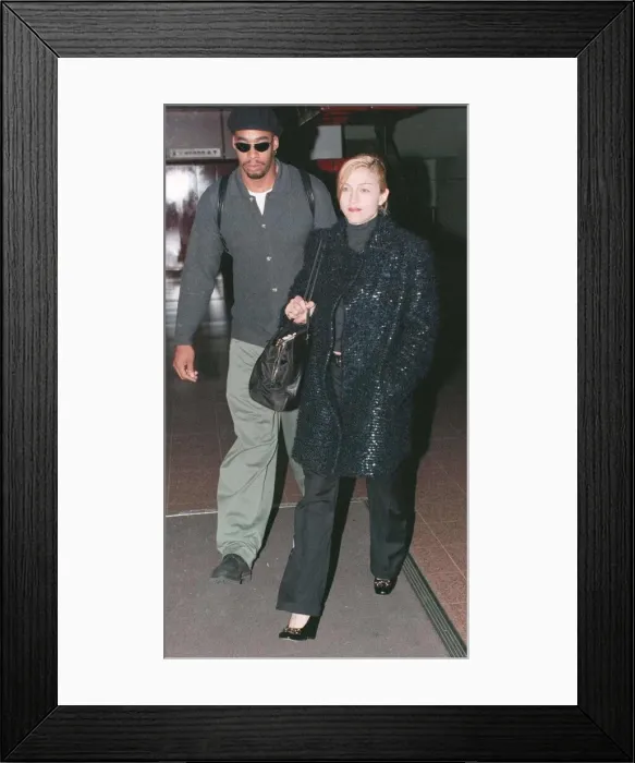 Framed Print : Madonna singer and actress arrives at Heathrow Airport in London