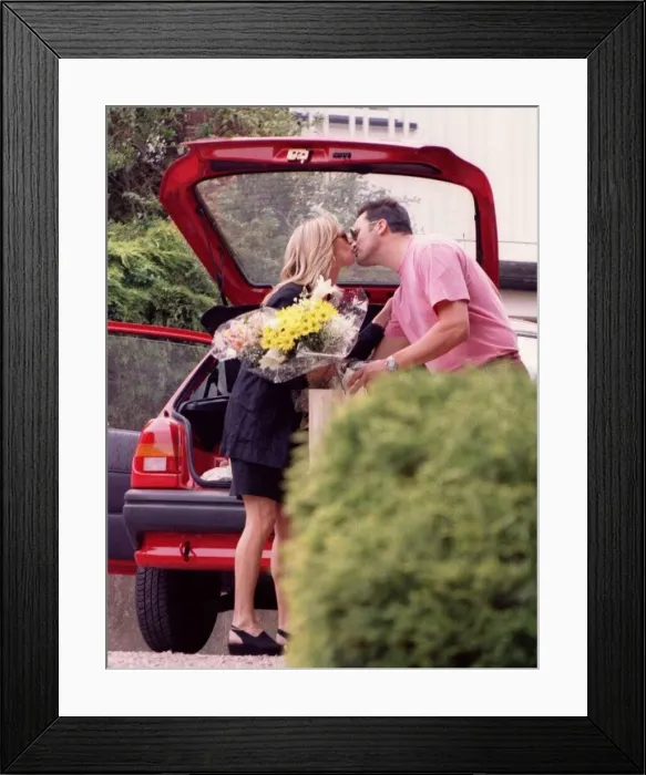 Framed Print : Gillian Taylforth Actress receives a birthday kiss from a man she claims is Roland Framed Print : Gillian Taylforth Actress receives a birthday kiss from a man she claims is Roland