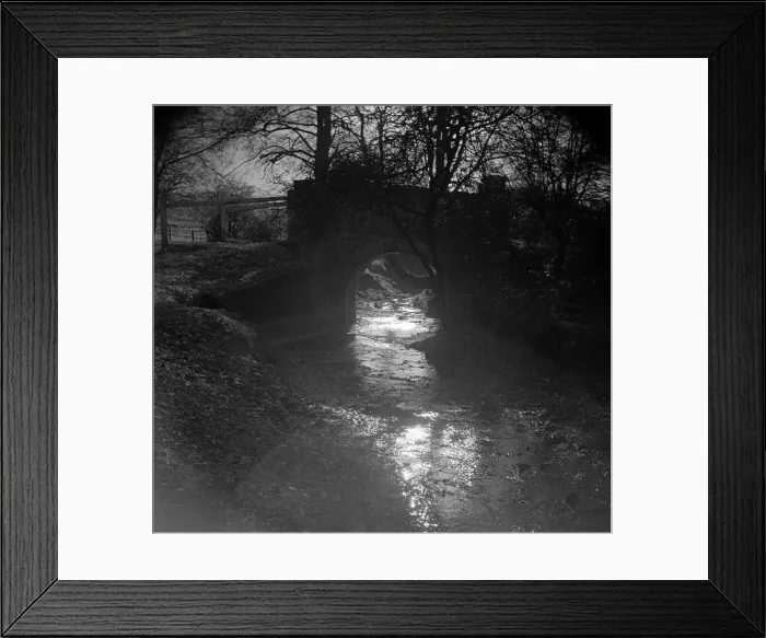 Framed Print : The old bridge at Hadley Woods in Hertfordshire, the dappled sunlight playing