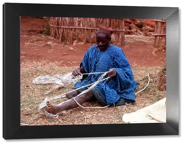 Babungu village Bamenda Highlands West Cameroon African making rope