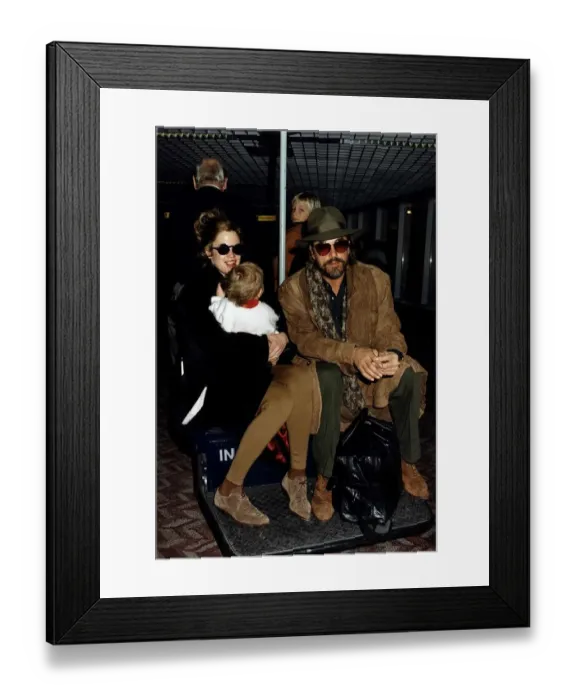 Framed Print : Don Johnson actor arrives with his wife Melanie Griffith actress at London Airport Framed Print : Don Johnson actor arrives with his wife Melanie Griffith actress at London Airport