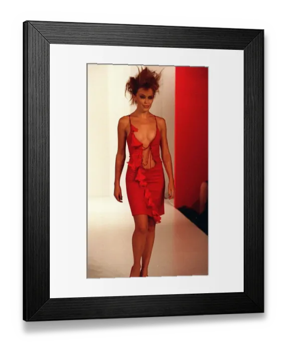 Framed Print : Kylie Minogue Singer Actress Model on the Cat Walk at the London Fashion Show parading in Framed Print : Kylie Minogue Singer Actress Model on the Cat Walk at the London Fashion Show parading in
