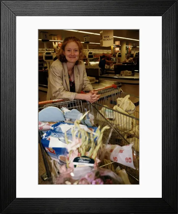 Framed Print : Kelly Hunter Actress shopping at her local sainsburys standing with trollys
