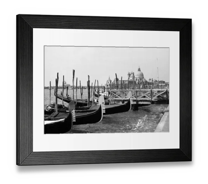 Framed Print : Gondolas moored with the Santa Maria della Salute church in the background in Venice