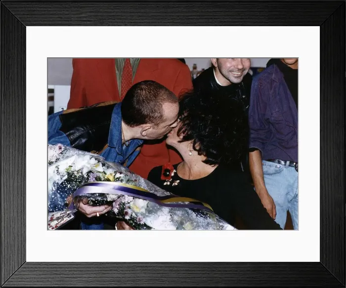 Framed Print : Elizabeth Taylor Actress recieves a kiss from AIDS sufferer Jan James at the London Framed Print : Elizabeth Taylor Actress recieves a kiss from AIDS sufferer Jan James at the London