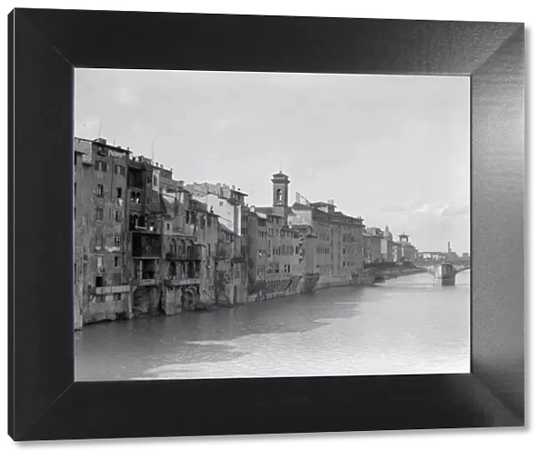 The River Arno at Florence seen from the Ponte Vecchio. Circa 1925