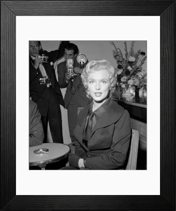 Framed Print : Actress Marylin Monroe at publicity shoot for their movie Framed Print : Actress Marylin Monroe at publicity shoot for their movie