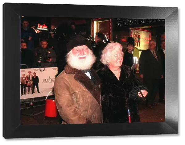 Buster Merryfield actor with wife attend the film premiere of Fierce Creatures in London