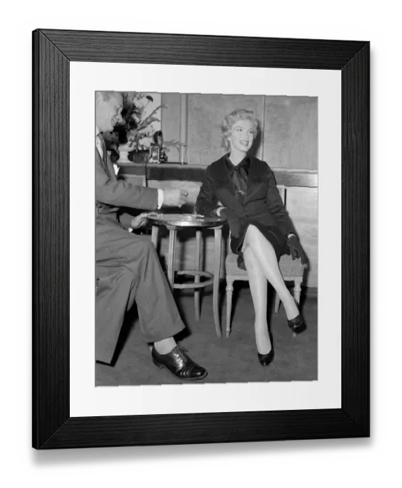 Framed Print : The Prince and the Showgirl. Marylin Monroe and Laurence Olivier at a publicity