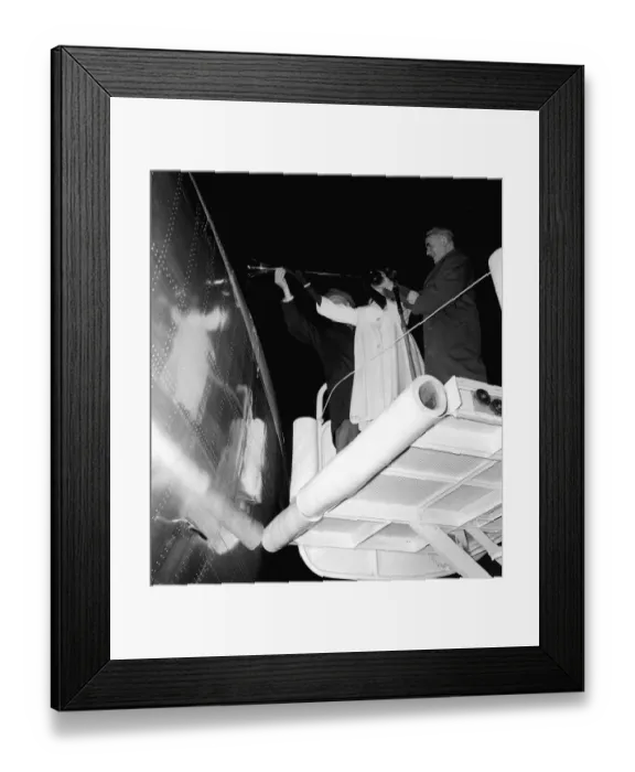 Framed Print : Sir Frank Whittle assisted by Janet Scott christen the first TWA jet aircraft to leave