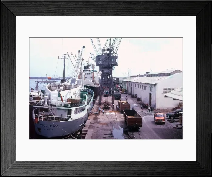 Framed Print : Ships being loaded and unloaded at the port of Luanda in Angola, Africa Circa 1970 Framed Print : Ships being loaded and unloaded at the port of Luanda in Angola, Africa Circa 1970