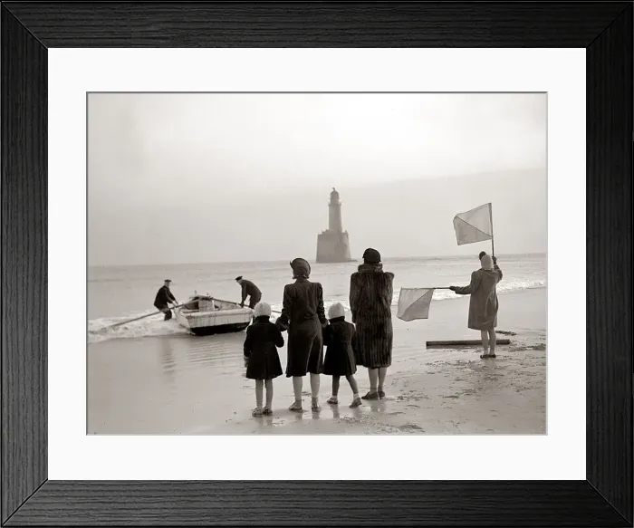 Framed Print : The families of the Rattray Head lighthouse keepers semaphore their loved ones as Old Framed Print : The families of the Rattray Head lighthouse keepers semaphore their loved ones as Old