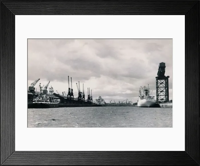 Framed Print : A shipping dock yard with cranes, and already docked are The New Zealand Star London