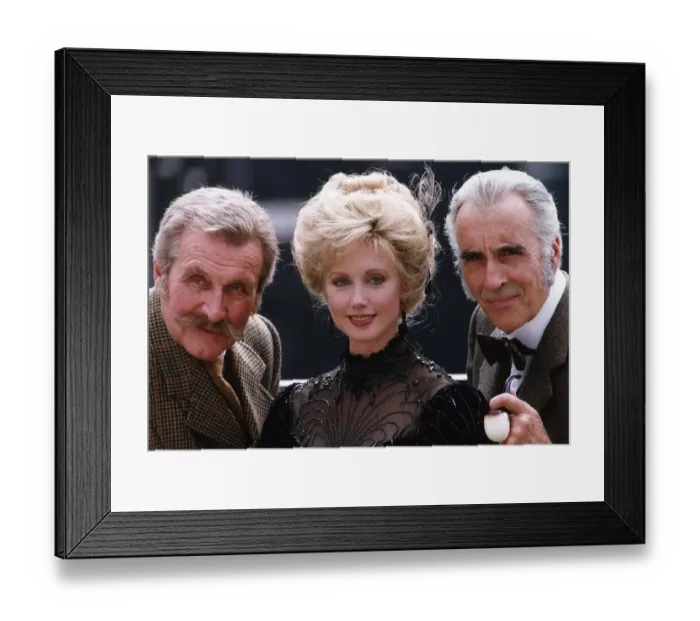 Framed Print : Morgan Fairchild centre with Christopher Lee right who plays the part of Sherlock Holmes Framed Print : Morgan Fairchild centre with Christopher Lee right who plays the part of Sherlock Holmes
