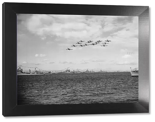 Queen Elizabeth II Coronation Fleet Review: a formation of Sea Fury aircraft fly up