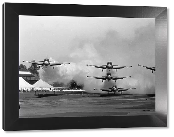 Aircraft Jet Provost trainers turn on the smoke Sept 1962 while landing in