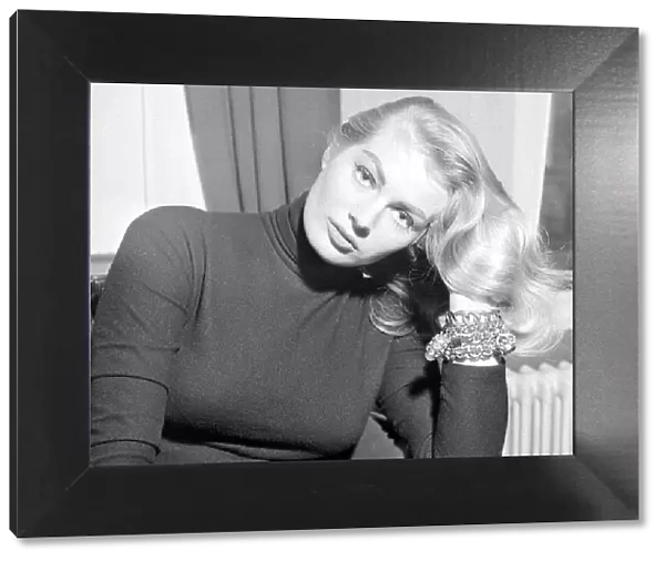 Actress Anita Ekberg seen here during a Daily Mirror photo shoot in her hotel room were