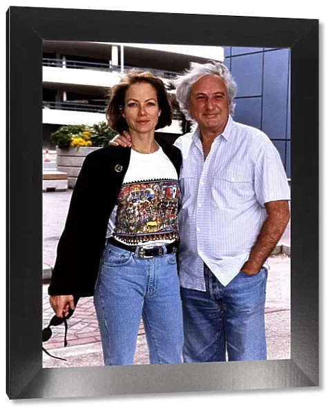 Michael Winner Film Director with actress girlfriend Jenny Seagrove at Heathrow airport