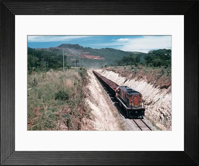 Framed Print : A loaded iron-ore train heads for the port of Mocamedes in South West Angola Circa
