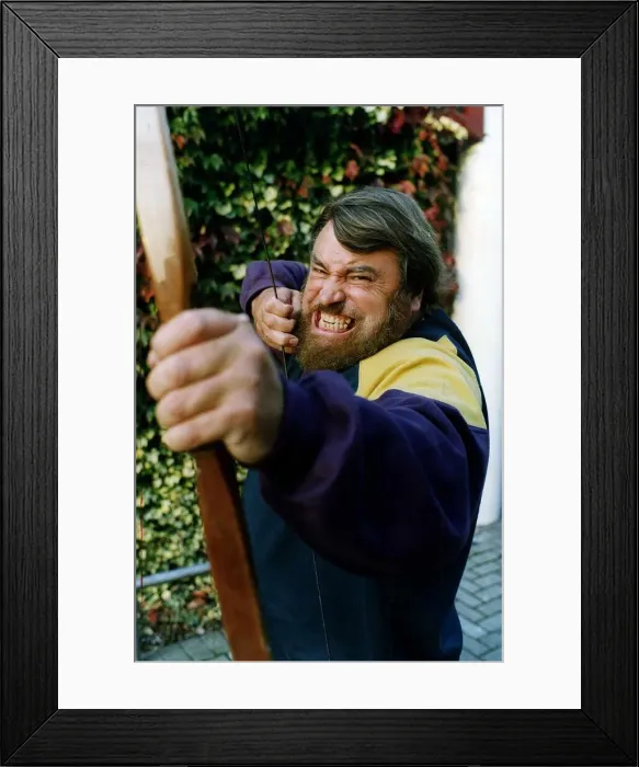 Framed Print : Brian Blessed actor pulling an 80lb crossbow Framed Print : Brian Blessed actor pulling an 80lb crossbow