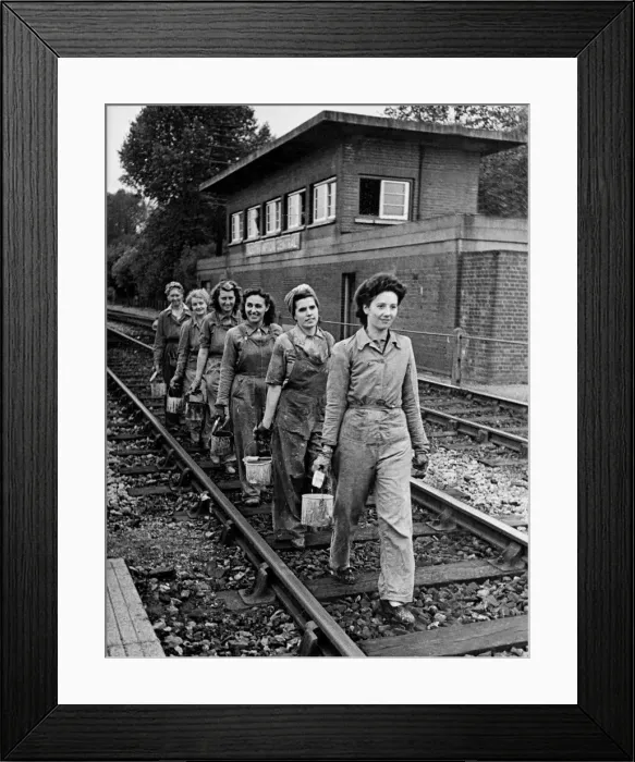 Framed Print : A team of girl painters employed by the Southern Division of the Southern Railway have