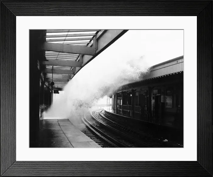 Framed Print : November Gales whip up a stormy sea. As the waves break against the sea wall they over Framed Print : November Gales whip up a stormy sea. As the waves break against the sea wall they over