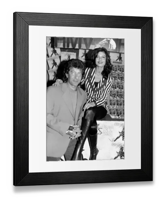 Framed Print : Catherine Zeta Jones Actress and Jeff Wayne at the HMV store Framed Print : Catherine Zeta Jones Actress and Jeff Wayne at the HMV store