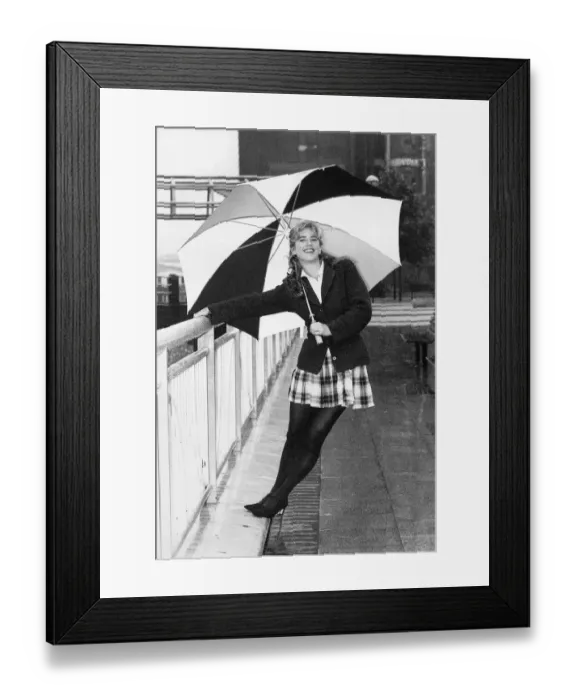 Framed Print : Imogen Stubbs Actress holding up Umbrella and leaning back while holding on to railing Framed Print : Imogen Stubbs Actress holding up Umbrella and leaning back while holding on to railing