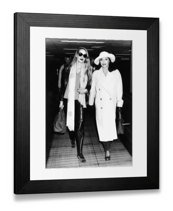 Framed Print : Joan Collins Actress With Supermodel Jerry Hall Wife Of Rock Star Mick Jagger Leaving Framed Print : Joan Collins Actress With Supermodel Jerry Hall Wife Of Rock Star Mick Jagger Leaving