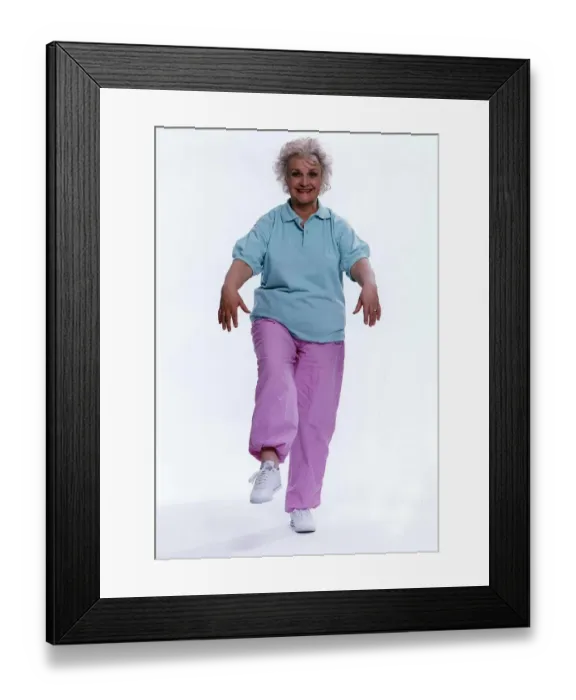 Framed Print : Jean Boht Actress who played Ma Nellie Boswell practices a keep fit routine in a People Framed Print : Jean Boht Actress who played Ma Nellie Boswell practices a keep fit routine in a People