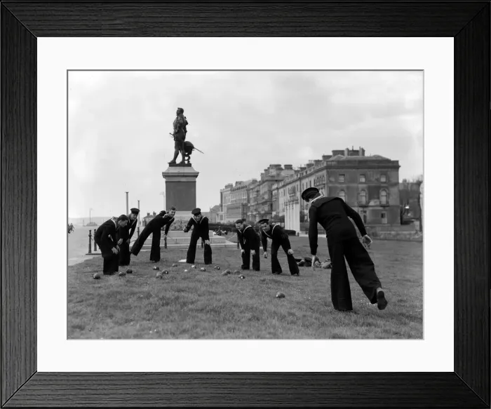 Framed Print : Sailors playing bowls on Plymouth Hoe under the watchful eye of Sir Francis Drake Framed Print : Sailors playing bowls on Plymouth Hoe under the watchful eye of Sir Francis Drake