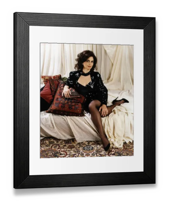 Framed Print : Nabila Khashoggi Actress Daughter of arms dealer Adnan Khashoggi Sitting on bed