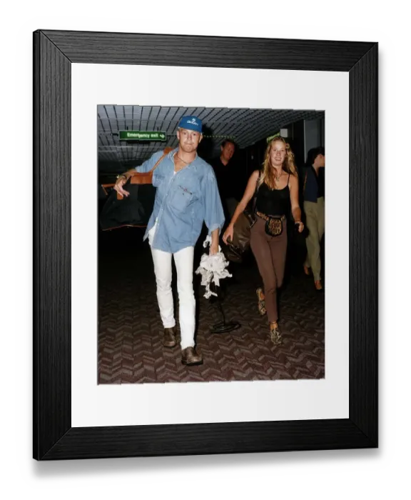 Framed Print : Jason Donovan actor and singer with girlfriend Tara Owens as they returned to Britain Framed Print : Jason Donovan actor and singer with girlfriend Tara Owens as they returned to Britain