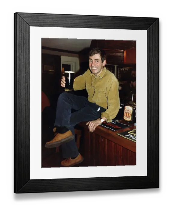 Framed Print : Melvyn Hayes Actor Publican in his Pub in St Albans Hertfordshire Sitting on Bar