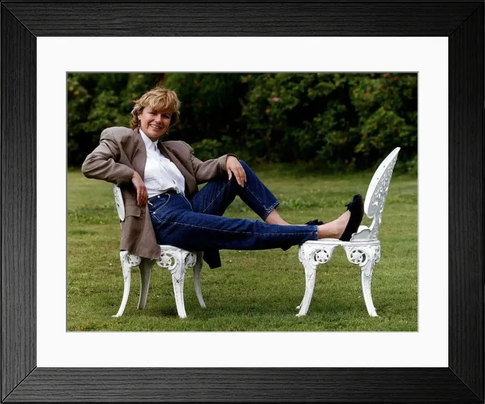 Framed Print : Julie Walters Actress and Commedienne Sitting on white garden chairs in garden Framed Print : Julie Walters Actress and Commedienne Sitting on white garden chairs in garden