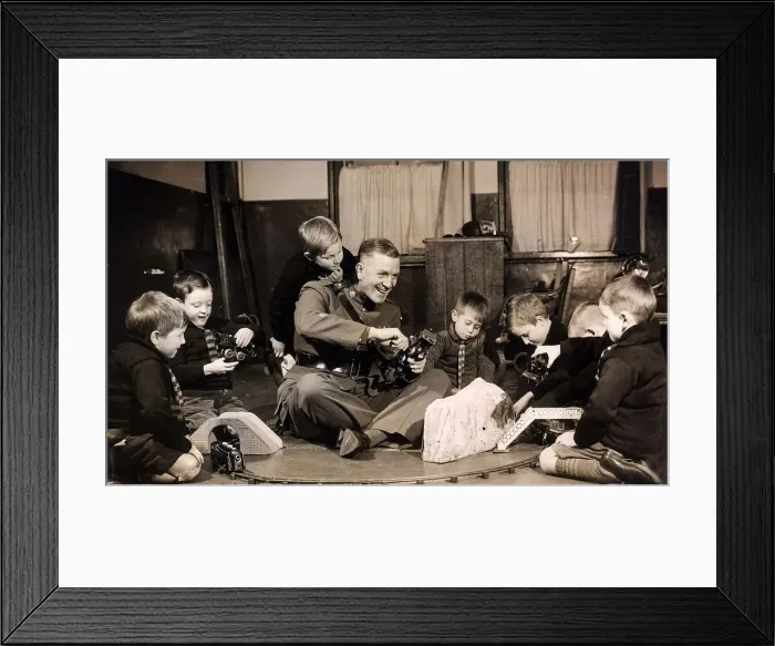 Framed Print : R. S. M. Wernham with some of the Barnados boys to whom he gave presents Framed Print : R. S. M. Wernham with some of the Barnados boys to whom he gave presents
