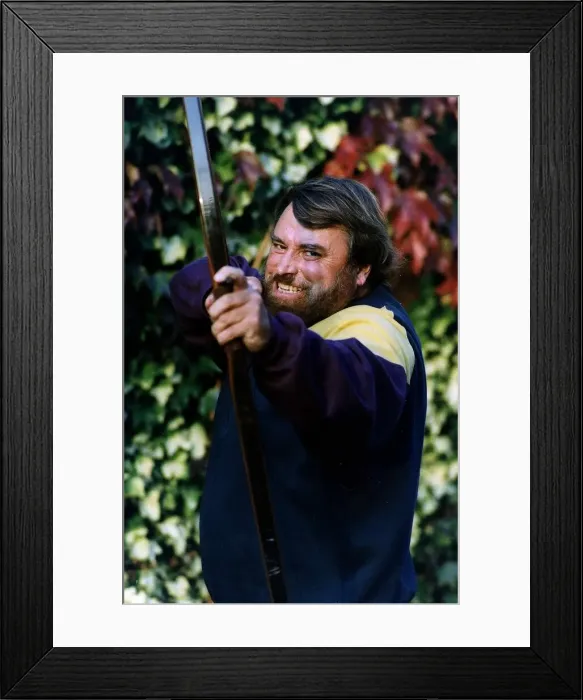 Framed Print : Brian Blessed Actor pulls an 80lb crossbow